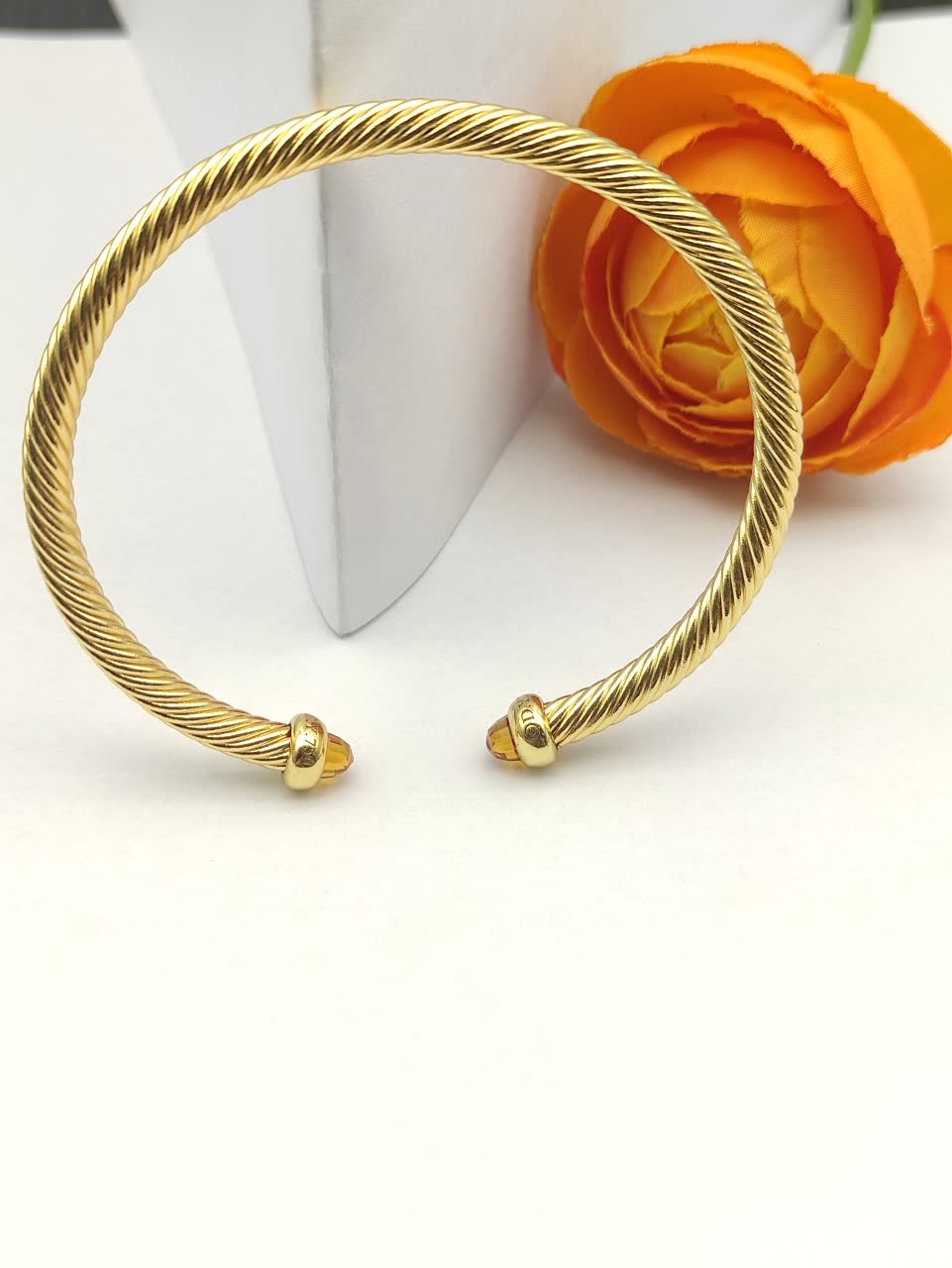 David Yurman Gold Tone Wire Bangle Bracelet with Orange Crystal Accents